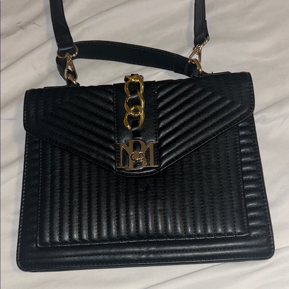 Black and Gold Crossbody Bag with Quilted Design and Flap Closure